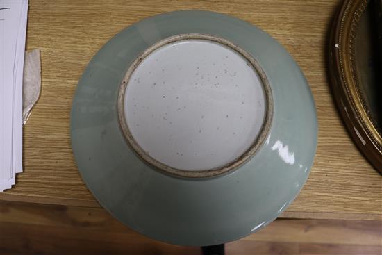 A Chinese white slip decorated celadon dish 35cm.